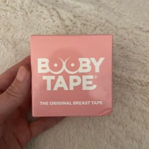 Unused breast tape